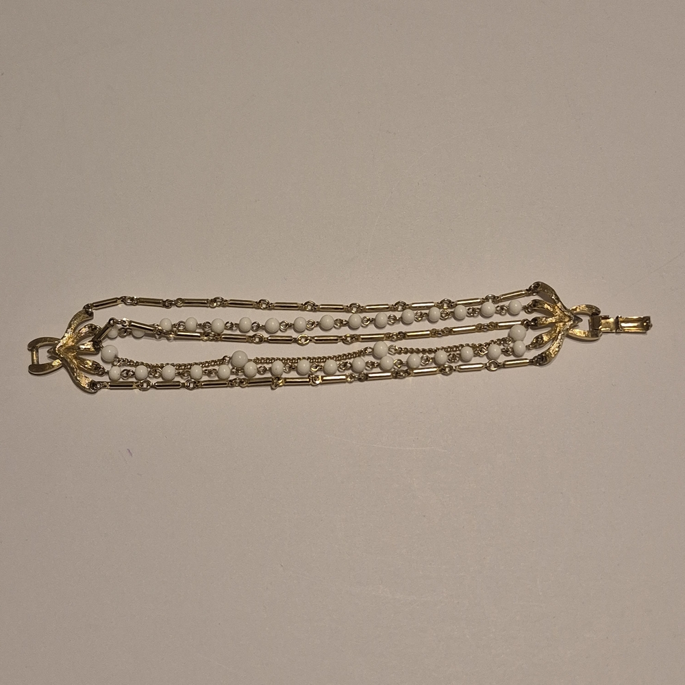 Elegant Gold and White Beaded Bracelet